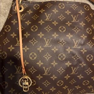 LV Artistry Leather Bag